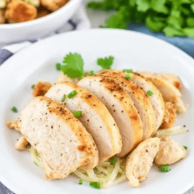 A variety of easy leftover rotisserie chicken recipes, including tacos, salad, and a creamy casserole, beautifully plated on a wooden table.